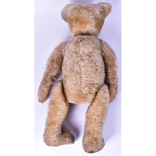 100 - Teddy Bear - a large early 20th century German (likely Steiff ) made teddy bear. Pale golden mohair,... 