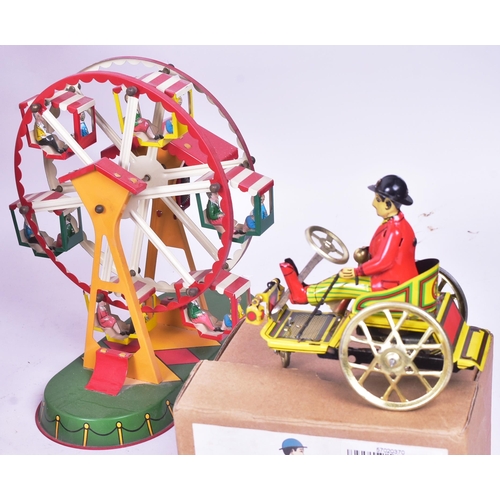 114 - Tinplate Toys - a collection of assorted tinplate clockwork mechanical toys to include a boxed Schyl... 