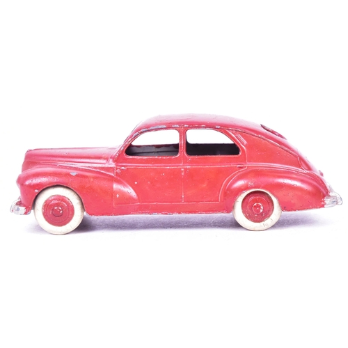 18 - French Dinky Toys - an original vintage French made Dinky Toys model Peugeot 203. Brown with crea, w... 