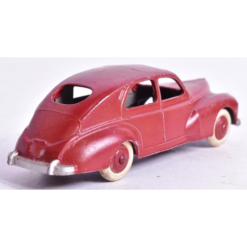 18 - French Dinky Toys - an original vintage French made Dinky Toys model Peugeot 203. Brown with crea, w... 