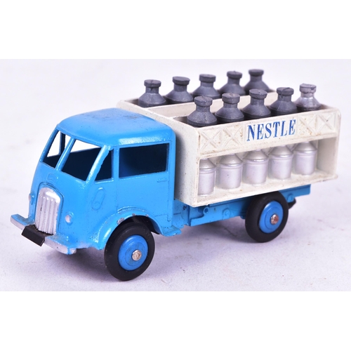 3 - French Dinky Toys - an original vintage French made Dinky Toys boxed diecast model No. 25 O Nestle D... 