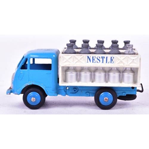 3 - French Dinky Toys - an original vintage French made Dinky Toys boxed diecast model No. 25 O Nestle D... 