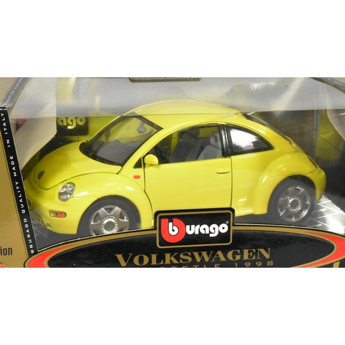 396 - Diecast - a collection of x4 boxed 1/18 scale diecast model cars comprising; Burago Volkswagen Beetl... 