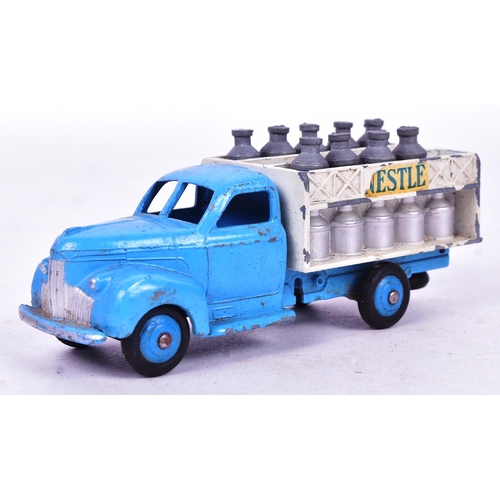 40 - French Dinky Toys - an original vintage French made Dinky Toys boxed diecast model No. 25 O Nestle D... 