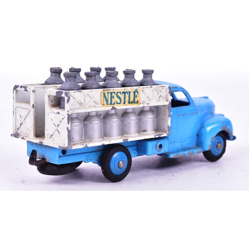 40 - French Dinky Toys - an original vintage French made Dinky Toys boxed diecast model No. 25 O Nestle D... 