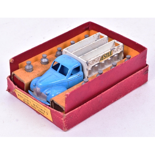 40 - French Dinky Toys - an original vintage French made Dinky Toys boxed diecast model No. 25 O Nestle D... 