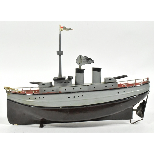 50 - Tinplate Toys - an original vintage German Fleischmann made tinplate clockwork model of a war ship. ... 