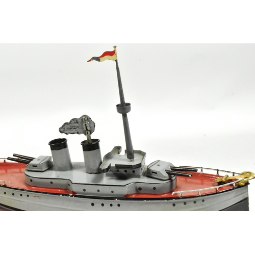 50 - Tinplate Toys - an original vintage German Fleischmann made tinplate clockwork model of a war ship. ... 