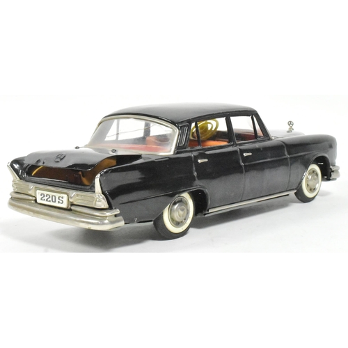 60 - Tinplate Toys - an original vintage Japanese SSS tinplate friction motor Mercedes Benz 220S with a m... 