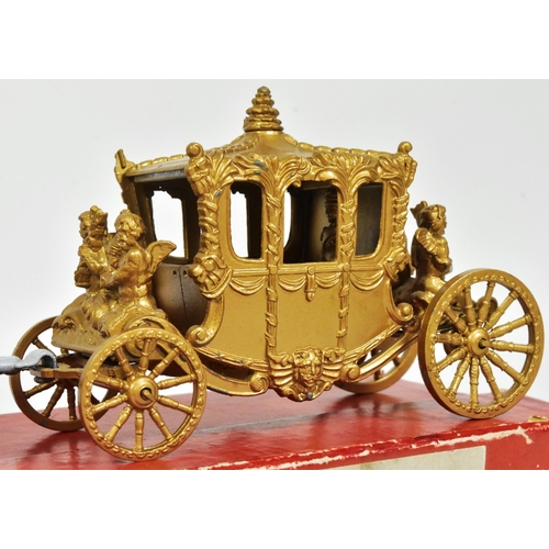 61 - An original vintage Lesney made Queen Elizabeth Coronation Coach. The lead diecast model with eight ... 