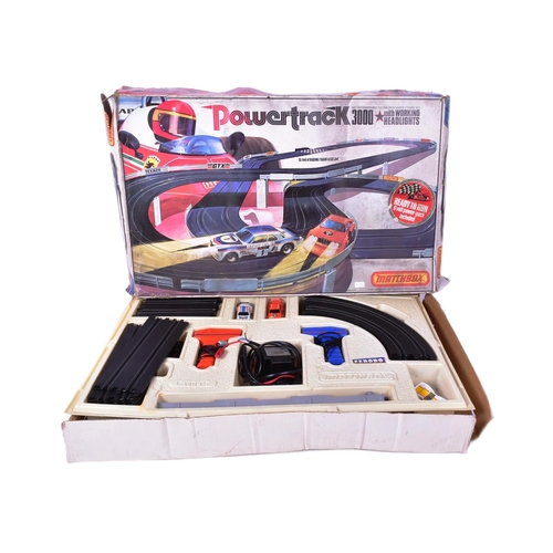 93 - Matchbox - a vintage Powertrack 3000 set with working headlights. To include: two controllers, a B.M... 