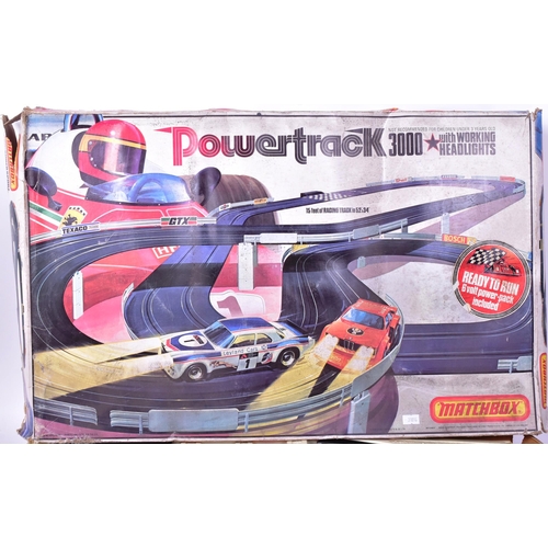 93 - Matchbox - a vintage Powertrack 3000 set with working headlights. To include: two controllers, a B.M... 