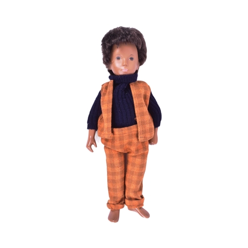 95 - Sasha Doll - An original vintage 1970s vinyl Sasha Doll ' Gregor '. Brown hair, with a woollen check... 