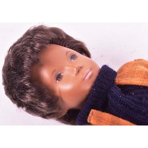 95 - Sasha Doll - An original vintage 1970s vinyl Sasha Doll ' Gregor '. Brown hair, with a woollen check... 