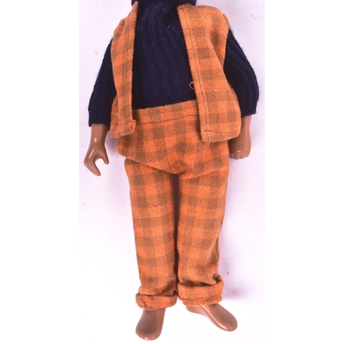 95 - Sasha Doll - An original vintage 1970s vinyl Sasha Doll ' Gregor '. Brown hair, with a woollen check... 