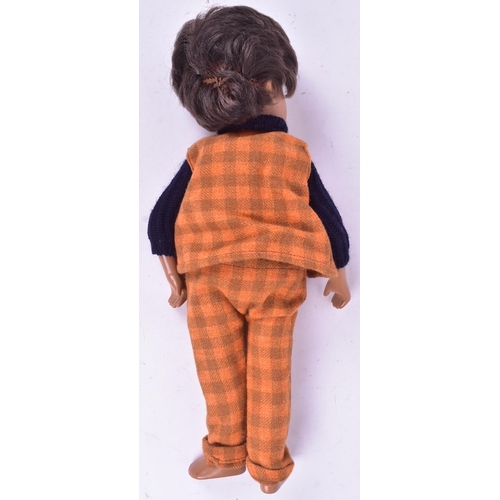 95 - Sasha Doll - An original vintage 1970s vinyl Sasha Doll ' Gregor '. Brown hair, with a woollen check... 