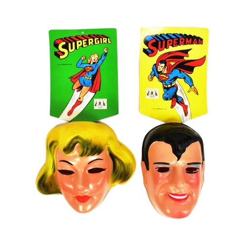 410 - DC Comics - x2 vintage 1979 DC Comics plastic dress-up masks 'Supergirl' and 'Superman'. Both NOS / ... 