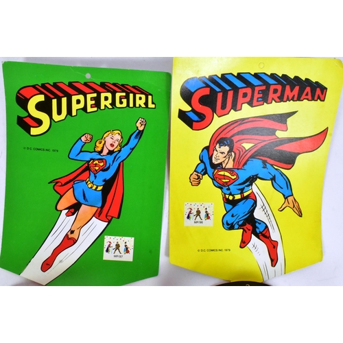 410 - DC Comics - x2 vintage 1979 DC Comics plastic dress-up masks 'Supergirl' and 'Superman'. Both NOS / ... 