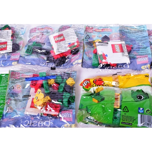 411 - Lego - a collection of vintage 1990s Mcdonalds Happy Meals Lego polybag sets to include Basic, Duplo... 