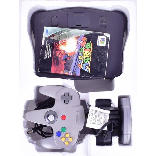 444 - Retro Gaming - original vintage Nintendo 64 video game console with Mario 64 game cartridge and inst... 