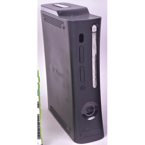 447 - Gaming - Two Microsoft Xbox video gaming consoles comprising the original Xbox and Xbox 360 along wi... 