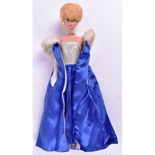 450 - Barbie - an original vintage c1960s Mattel made Barbie doll, with collection of outfits and accessor... 