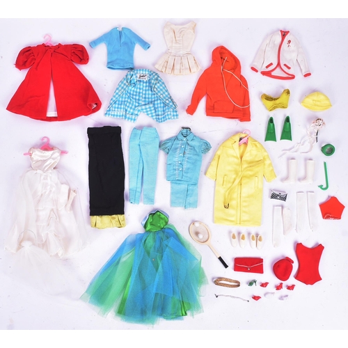 450 - Barbie - an original vintage c1960s Mattel made Barbie doll, with collection of outfits and accessor... 