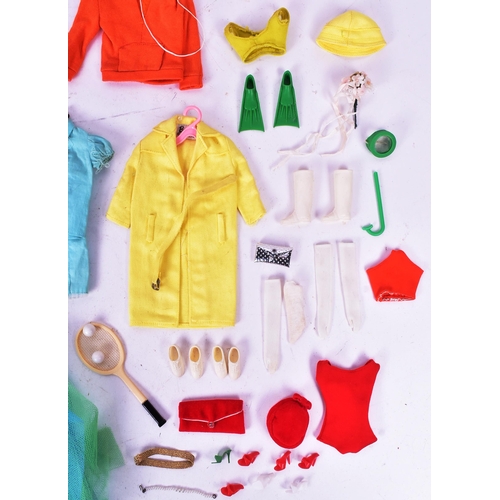 450 - Barbie - an original vintage c1960s Mattel made Barbie doll, with collection of outfits and accessor... 