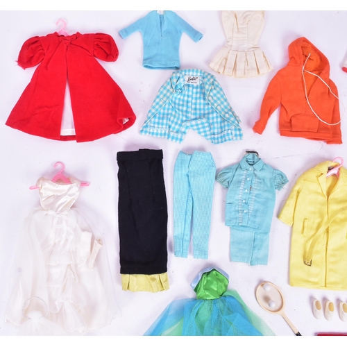 450 - Barbie - an original vintage c1960s Mattel made Barbie doll, with collection of outfits and accessor... 