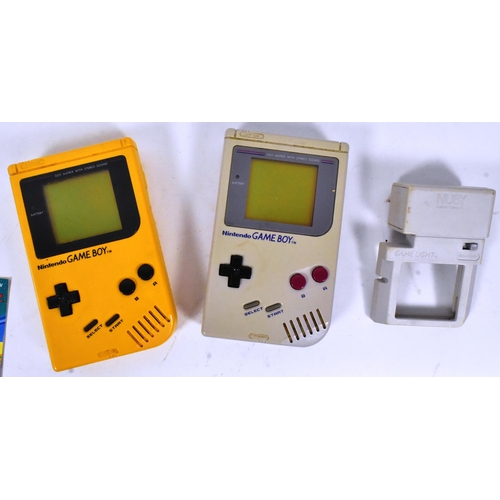 462 - Nintendo - Game Boy - two vintage Nintendo Gameboy handheld consoles, one in classic grey the other ... 