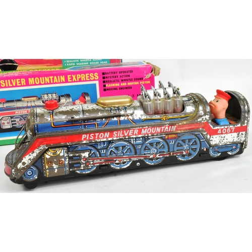 483 - Tinplate Toys - x2 vintage Japanese tinplate battery operated locomotives comprising Union Pacific E... 