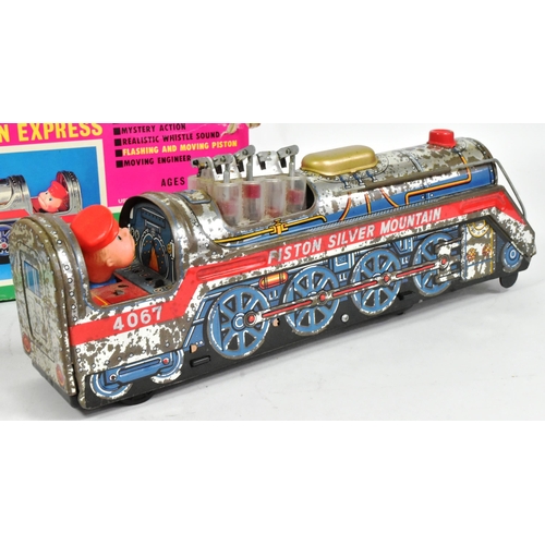 483 - Tinplate Toys - x2 vintage Japanese tinplate battery operated locomotives comprising Union Pacific E... 