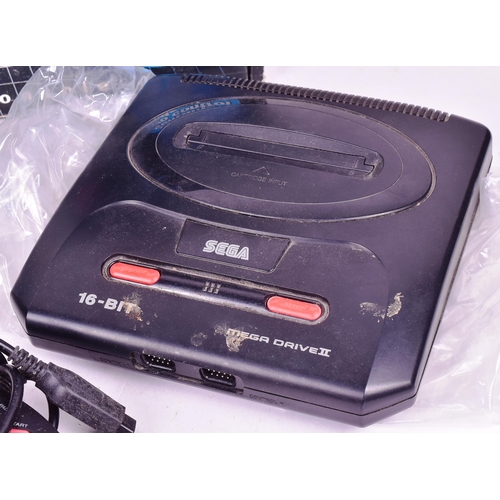 484 - Retro Gaming - an original vintage Sega made 16-bit Mega Drive II video game console with x6 games. ... 