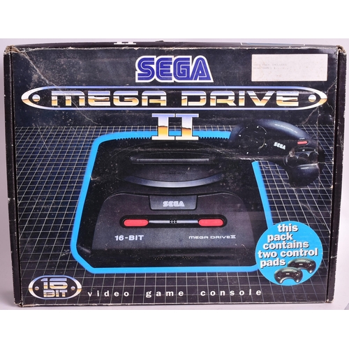 484 - Retro Gaming - an original vintage Sega made 16-bit Mega Drive II video game console with x6 games. ... 