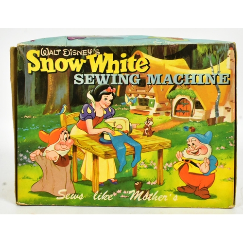 496 - Retro Toys - an original circa 1950s Little Betty Walt Disney's Snow White Sewing Machine. Boxed wit... 