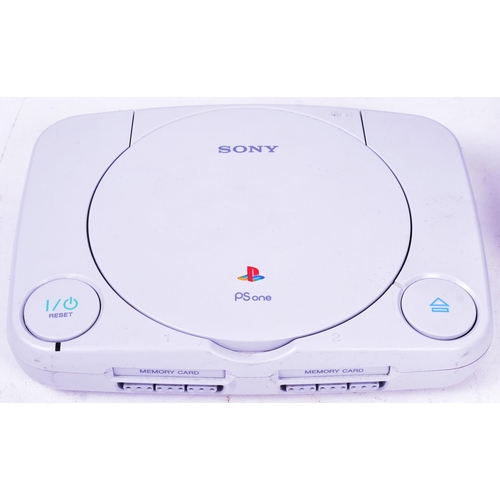 498 - Retro Gaming - a collection of x3 vintage Sony PS1 Playstation One consoles and video games to inclu... 