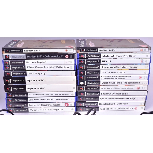 518 - Retro Gaming - an original Sony PS2 Playstation 2 along with a collection of x23 games comprising; R... 