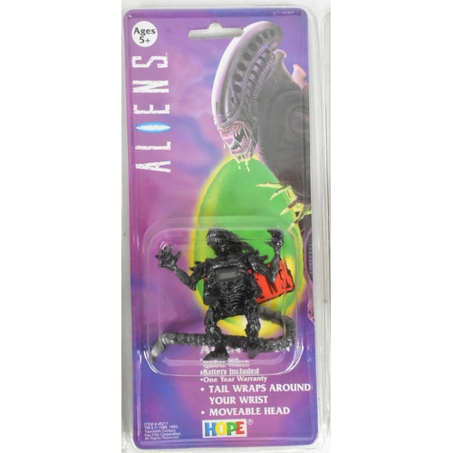 581 - Aliens - Four 1993 Hope Industries made Aliens wristwatches ' Alien Queen '. All factory sealed in t... 