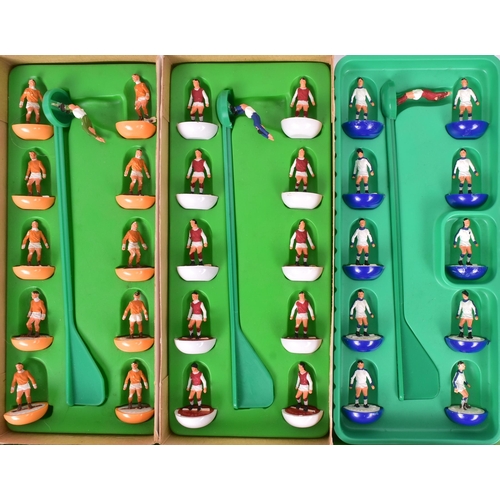 592 - Subbuteo - a collection of Subbuteo table top football game teams and accessories to include x4 team... 