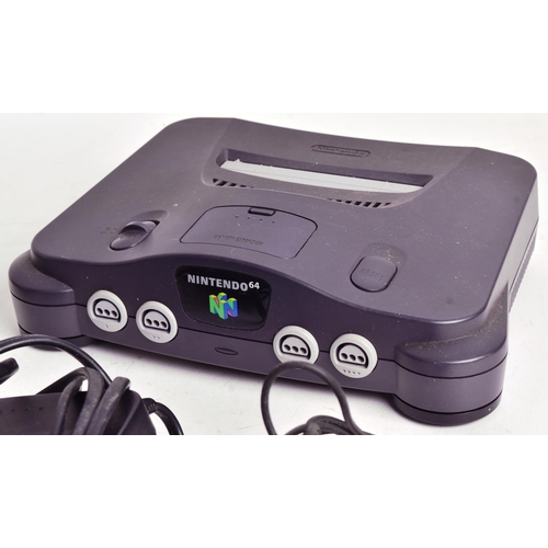 594 - Retro Gaming - an original vintage Nintendo 64 video game console with games comprising; James Bond ... 