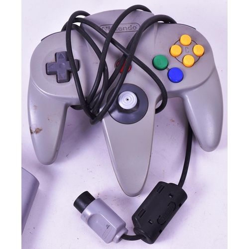 594 - Retro Gaming - an original vintage Nintendo 64 video game console with games comprising; James Bond ... 
