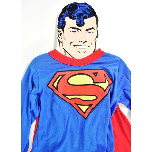 596 - Superman - a c1970s Superman ex-shop-stock dress up / costume set for a child. Comprising of red and... 