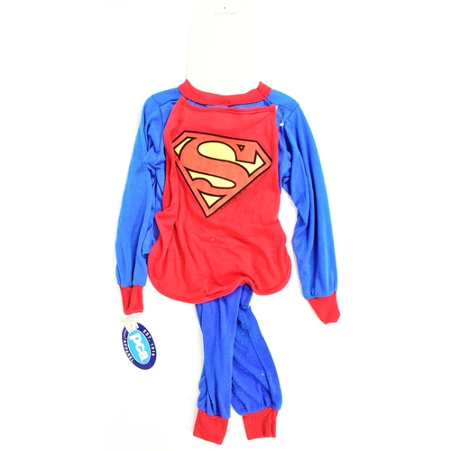 596 - Superman - a c1970s Superman ex-shop-stock dress up / costume set for a child. Comprising of red and... 