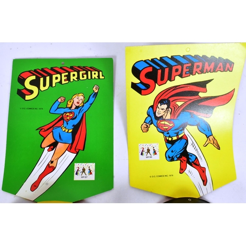 600 - DC Comics - x2 vintage 1979 DC Comics plastic dress-up masks 'Supergirl' and 'Superman'. Both NOS / ... 