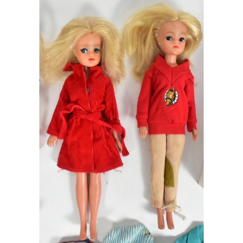 649 - Sindy - a large collection of assorted vintage c1970s Pedigree made Sindy dolls, clothing and access... 