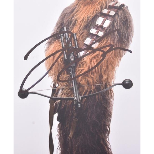 657 - Star Wars - Joonas Suotamo - Chewbacca - an autographed 8x10