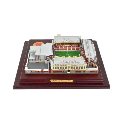 749 - An officially licenced Arsenal FC Football Club Highbury replica model stadium. The model mounted to... 