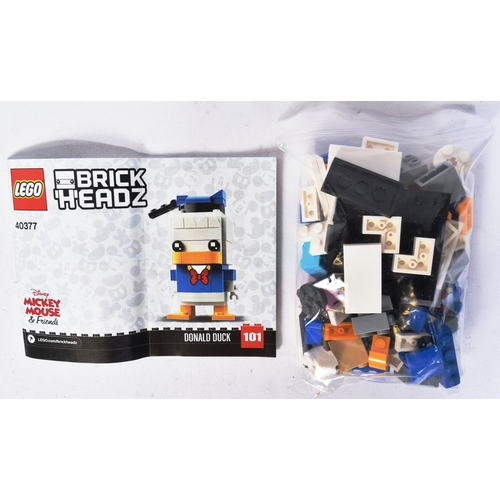 569 - Lego - x2 original Lego Brickheadz sets comprising; 40377 Donald Duck and 40378 Pluto & Goofy. The s... 