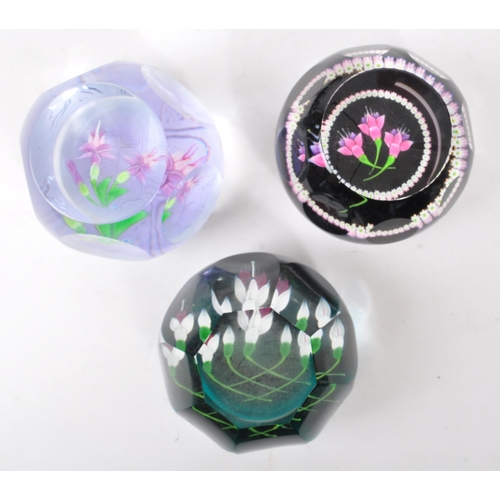 1 - Caithness - A collection of six Scottish crystal glass handmade paperweights together with a John De... 