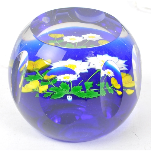 1 - Caithness - A collection of six Scottish crystal glass handmade paperweights together with a John De... 